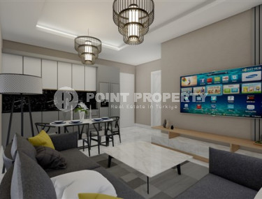 Новая квартира с одной спальней, 50м². в комплексе на этапе строительства в районе Махмутлар, Алания-id-2449-фото-2