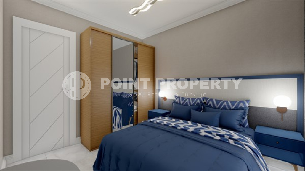 Новая квартира с одной спальней, 50м². в комплексе на этапе строительства в районе Махмутлар, Алания-id-2449-фото-5