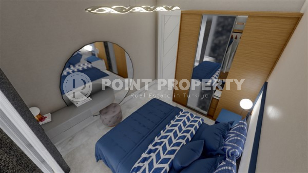 Новая квартира с одной спальней, 50м². в комплексе на этапе строительства в районе Махмутлар, Алания-id-2449-фото-7