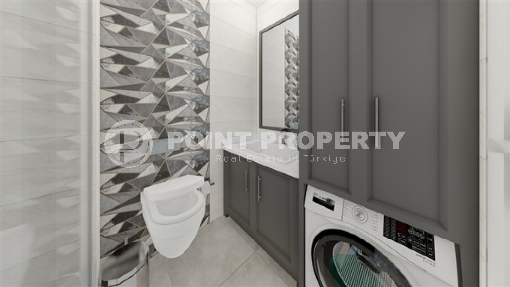 Новая квартира с одной спальней, 50м². в комплексе на этапе строительства в районе Махмутлар, Алания-id-2449-фото-8