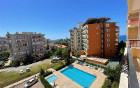 Apartment 2+1 in a complex on the first coastline in Mahmutlar, 125m2-id-1212-photo-1