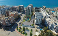 New three-room apartment, 95m², in an elite complex on the seafront in Oba, Alanya-id-2465-photo-1