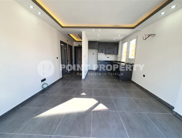 Two-room apartment with 1+1 layout, 60 m2 in one of the popular areas of Mahmutlar. Only 250 m to the sea. An excellent option for moving.-id-1213-photo-3
