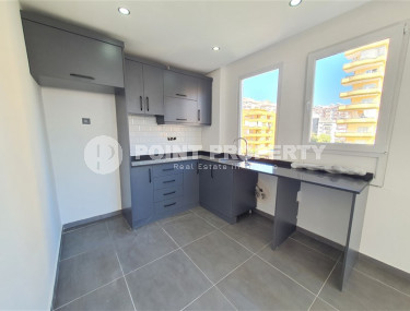 Two-room apartment with 1+1 layout, 60 m2 in one of the popular areas of Mahmutlar. Only 250 m to the sea. An excellent option for moving.-id-1213-photo-4