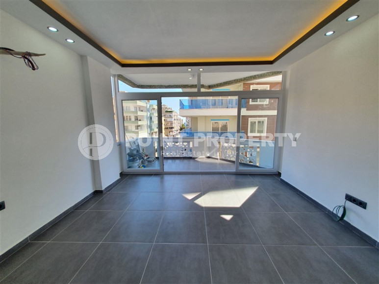 Two-room apartment with 1+1 layout, 60 m2 in one of the popular areas of Mahmutlar. Only 250 m to the sea. An excellent option for moving.-id-1213-photo-5