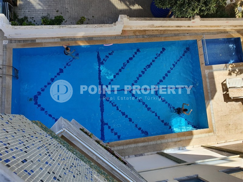 Two-room apartment with 1+1 layout, 60 m2 in one of the popular areas of Mahmutlar. Only 250 m to the sea. An excellent option for moving.-id-1213-photo-7