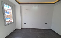 Two-room apartment with 1+1 layout, 60 m2 in one of the popular areas of Mahmutlar. Only 250 m to the sea. An excellent option for moving.-id-1213-photo-8