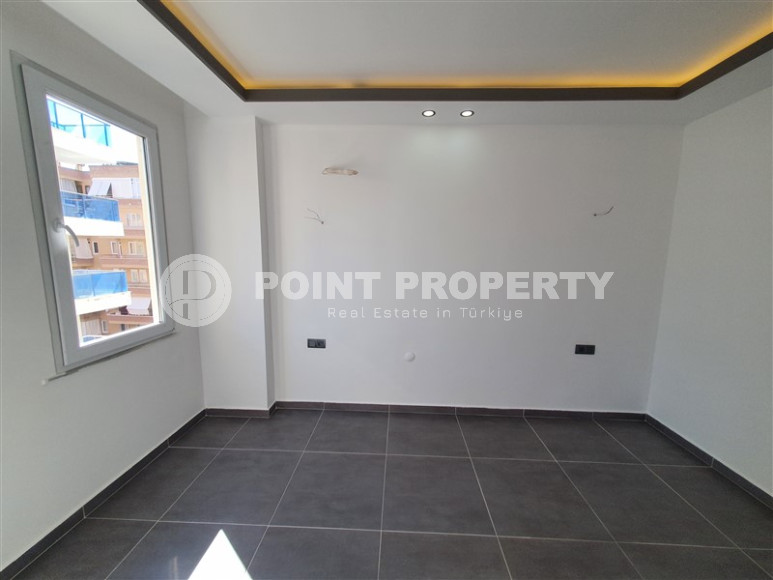 Two-room apartment with 1+1 layout, 60 m2 in one of the popular areas of Mahmutlar. Only 250 m to the sea. An excellent option for moving.-id-1213-photo-8