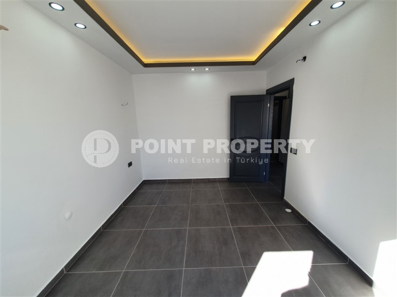 Two-room apartment with 1+1 layout, 60 m2 in one of the popular areas of Mahmutlar. Only 250 m to the sea. An excellent option for moving.-id-1213-photo-9