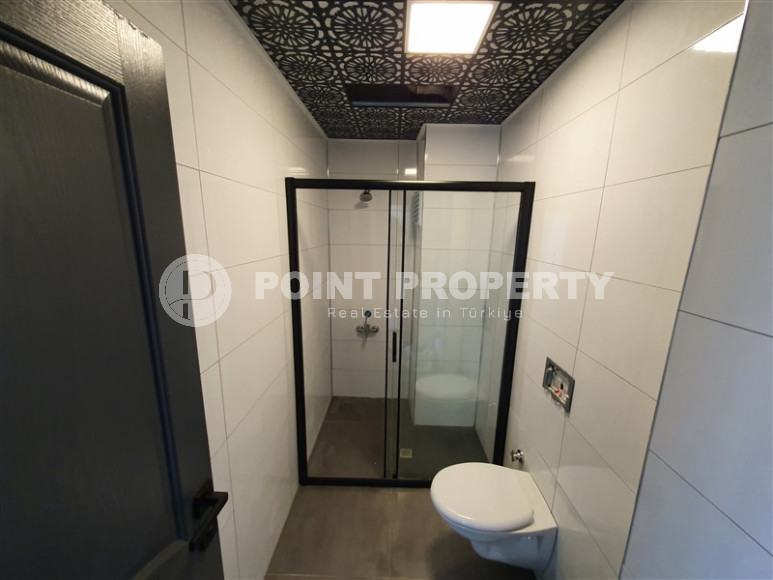 Two-room apartment with 1+1 layout, 60 m2 in one of the popular areas of Mahmutlar. Only 250 m to the sea. An excellent option for moving.-id-1213-photo-10