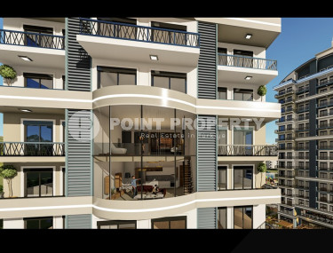 Two-room apartment with mountain views in a new complex in Mahmutlar-id-1211-photo-4