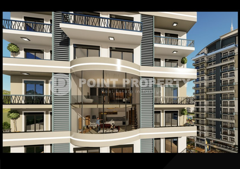 Two-room apartment with mountain views in a new complex in Mahmutlar-id-1211-photo-4