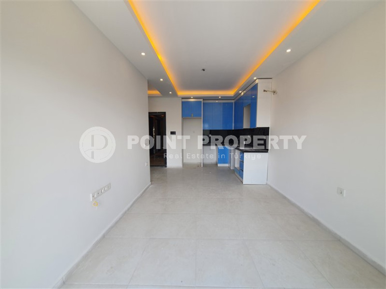 Two-room apartment with mountain views in a new complex in Mahmutlar-id-1211-photo-10