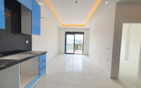 Two-room apartment with mountain views in a new complex in Mahmutlar-id-1211-photo-13