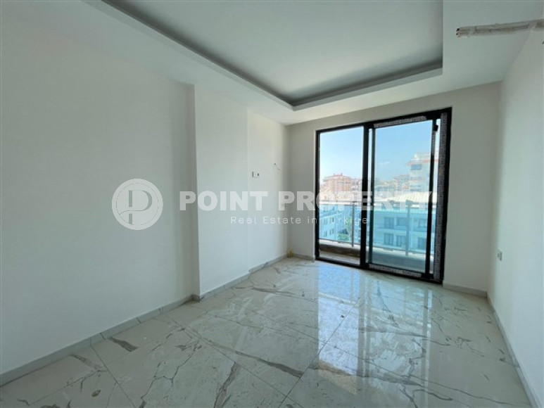 One-room apartment, 52m², in an elite new building in Mahmutlar, 500m from the sea, Alanya-id-2478-photo-11