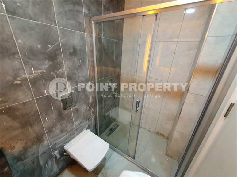 Two-room apartment with mountain views in a new complex in Mahmutlar-id-1211-photo-20