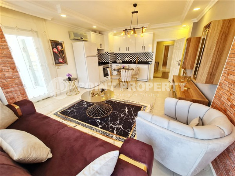 Stylish three-room apartment, 125m², in a complex with infrastructure in Mahmutlar, Alanya-id-2482-photo-3