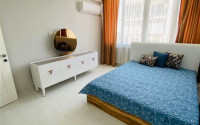 Three-room apartment with a separate kitchen in the popular area of Mahmutlar.-id-1216-photo-3