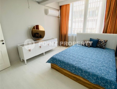 Three-room apartment with a separate kitchen in the popular area of Mahmutlar.-id-1216-photo-3