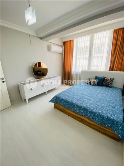 Three-room apartment with a separate kitchen in the popular area of Mahmutlar.-id-1216-photo-3