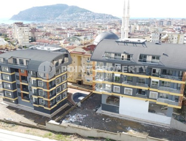 Новая трехкомнатная квартира, 120м², в резиденции с бассейном в 1100м от пляжа Клеопатры, Алания-id-2495-фото-2