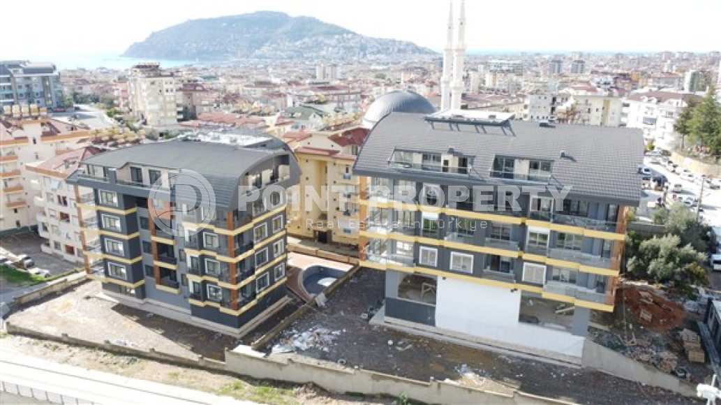 Новая трехкомнатная квартира, 120м², в резиденции с бассейном в 1100м от пляжа Клеопатры, Алания-id-2495-фото-2