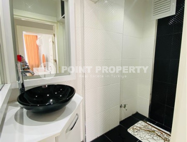 Three-room apartment with a separate kitchen in the popular area of Mahmutlar.-id-1216-photo-4