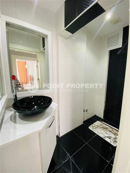 Three-room apartment with a separate kitchen in the popular area of Mahmutlar.-id-1216-photo-4