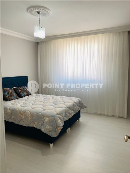 Three-room apartment with a separate kitchen in the popular area of Mahmutlar.-id-1216-photo-6