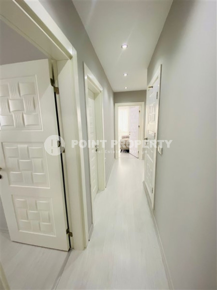 Three-room apartment with a separate kitchen in the popular area of Mahmutlar.-id-1216-photo-7