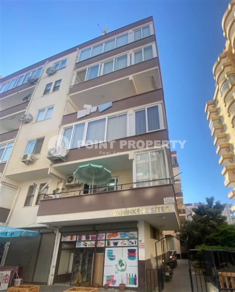 Three-room apartment with a separate kitchen in the popular area of Mahmutlar.-id-1216-photo-8
