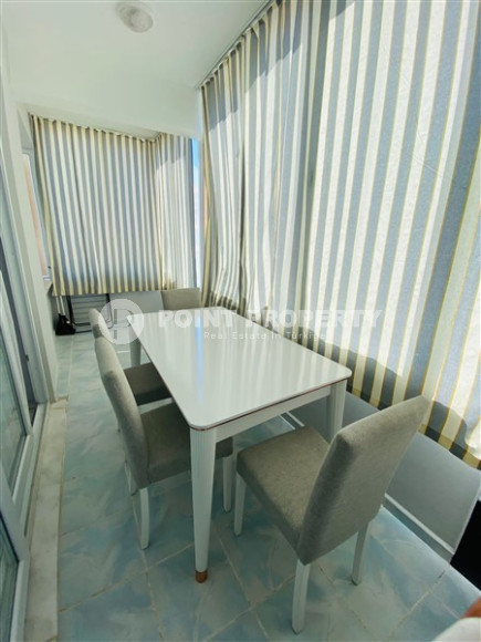 Three-room apartment with a separate kitchen in the popular area of Mahmutlar.-id-1216-photo-9