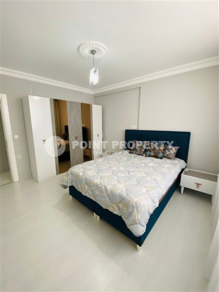 Three-room apartment with a separate kitchen in the popular area of Mahmutlar.-id-1216-photo-10