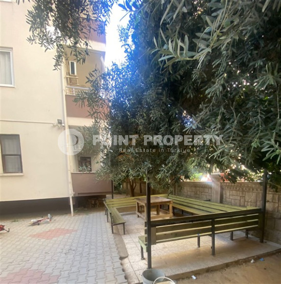 Three-room apartment with a separate kitchen in the popular area of Mahmutlar.-id-1216-photo-12