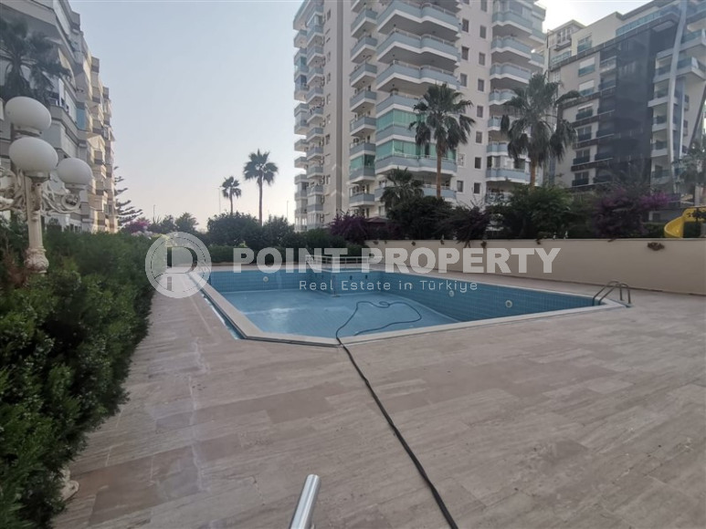 Three-room apartment with 2+1 layout, 100 m2 in Alanya, in the popular Mahmutlar area. Only 250 m to the sea.-id-1217-photo-2