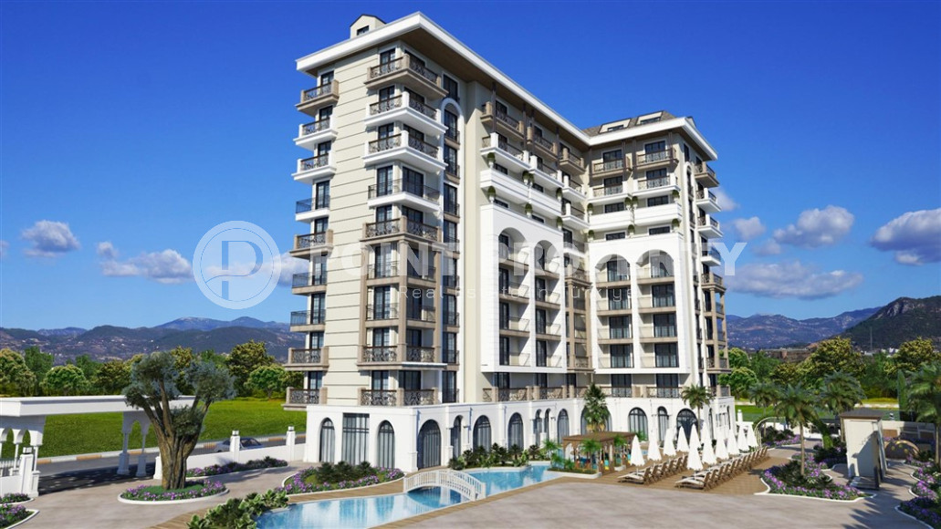 An elite complex at the excavation stage in the center of Alanya, within easy reach of the beach and the historical port.-id-1021-photo-1