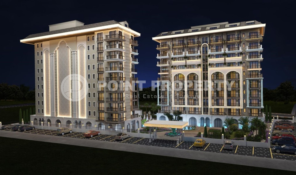 An elite complex at the excavation stage in the center of Alanya, within easy reach of the beach and the historical port.-id-1021-photo-2