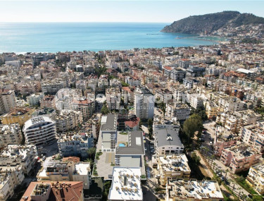 Элитный комплекс на стадии котлована в центре Алании, в доступности от пляжа и исторического порта.-id-1021-фото-3