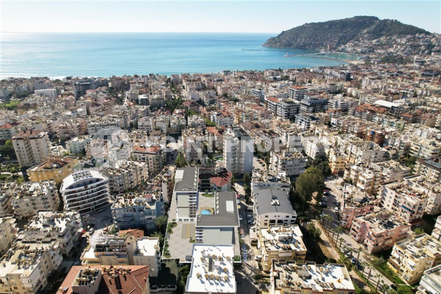 An elite complex at the excavation stage in the center of Alanya, within easy reach of the beach and the historical port.-id-1021-photo-3