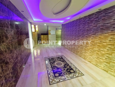 Excellent two-room apartment with 1+1 layout, 65 m2 in Alanya in Mahmutlar. Only 350 m to the sea.-id-1215-photo-2