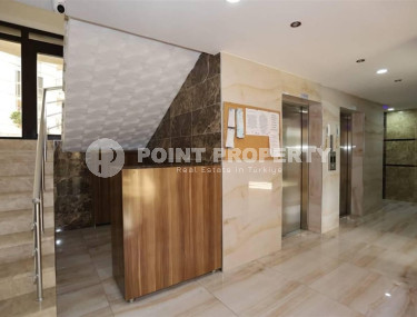 Excellent two-room apartment with 1+1 layout, 65 m2 in Alanya in Mahmutlar. Only 350 m to the sea.-id-1215-photo-3