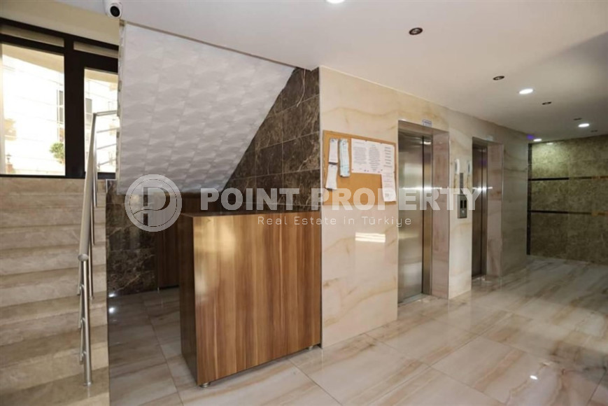 Excellent two-room apartment with 1+1 layout, 65 m2 in Alanya in Mahmutlar. Only 350 m to the sea.-id-1215-photo-3