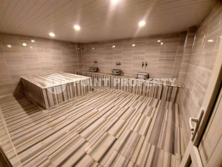 Excellent two-room apartment with 1+1 layout, 65 m2 in Alanya in Mahmutlar. Only 350 m to the sea.-id-1215-photo-9