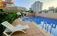 Excellent two-room apartment with 1+1 layout, 65 m2 in Alanya in Mahmutlar. Only 350 m to the sea.-id-1215-photo-10