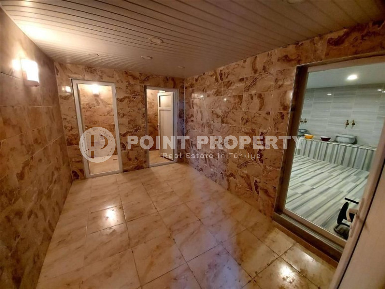 Excellent two-room apartment with 1+1 layout, 65 m2 in Alanya in Mahmutlar. Only 350 m to the sea.-id-1215-photo-11