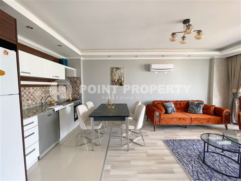 Excellent two-room apartment with 1+1 layout, 65 m2 in Alanya in Mahmutlar. Only 350 m to the sea.-id-1215-photo-18