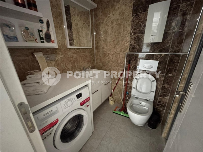 Excellent two-room apartment with 1+1 layout, 65 m2 in Alanya in Mahmutlar. Only 350 m to the sea.-id-1215-photo-21