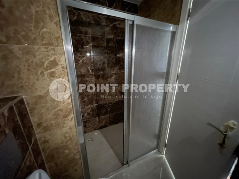 Excellent two-room apartment with 1+1 layout, 65 m2 in Alanya in Mahmutlar. Only 350 m to the sea.-id-1215-photo-22