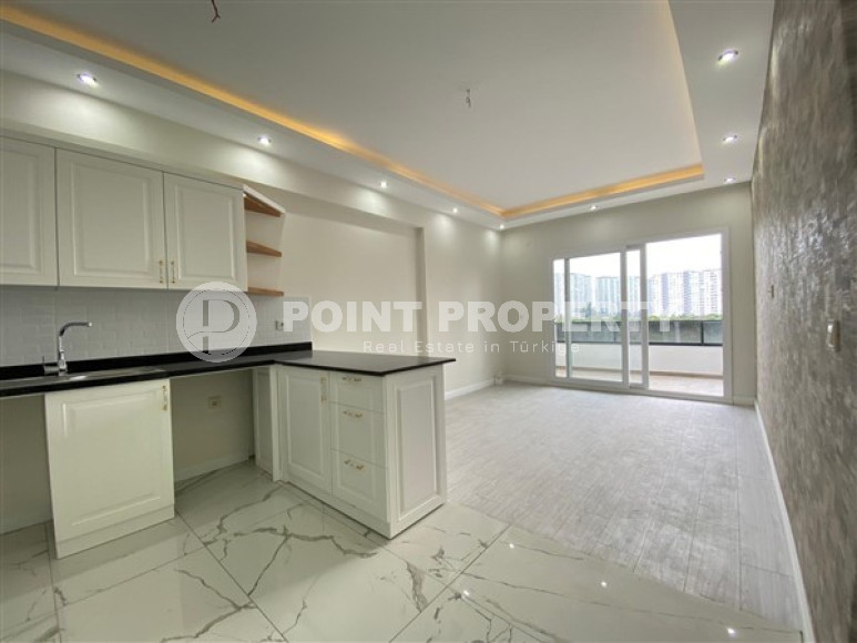 Квартира с одной спальней, 70м², в Арпачбахшиш, в районном центре Эрдемли, в 500м от моря-id-2523-фото-4