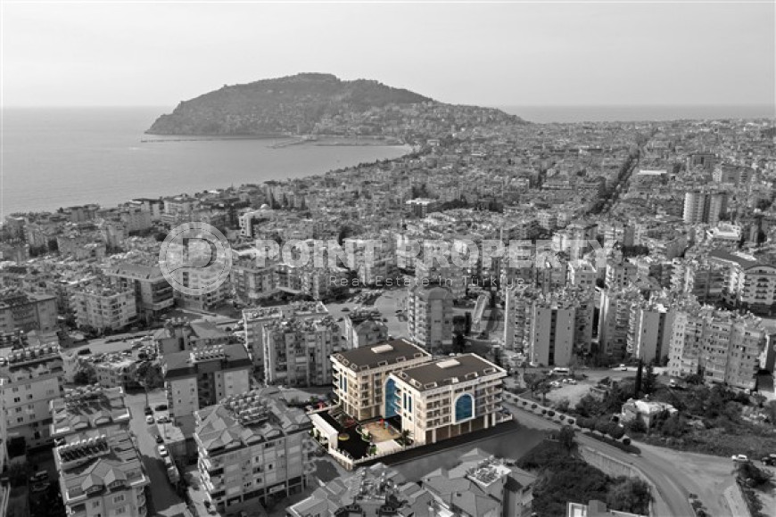 Апартаменты с тремя спальнями, 140м², в новом комплексе с хорошей инфраструктурой в центре Алании-id-2524-фото-2